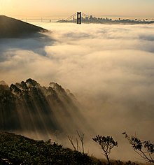 220px-San_francisco_in_fog_with_rays
